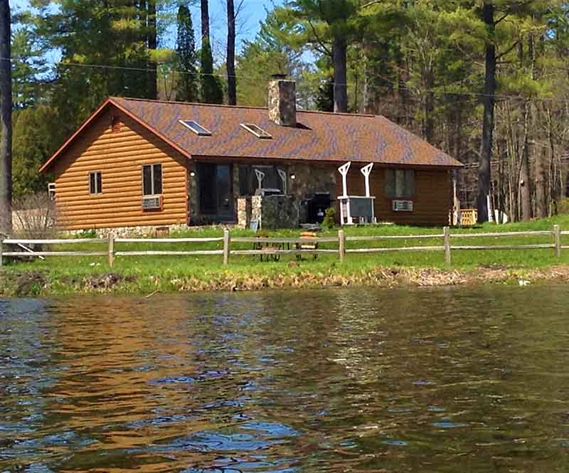 photo of a year-round rental cabin overlooking a private lake at the pmr