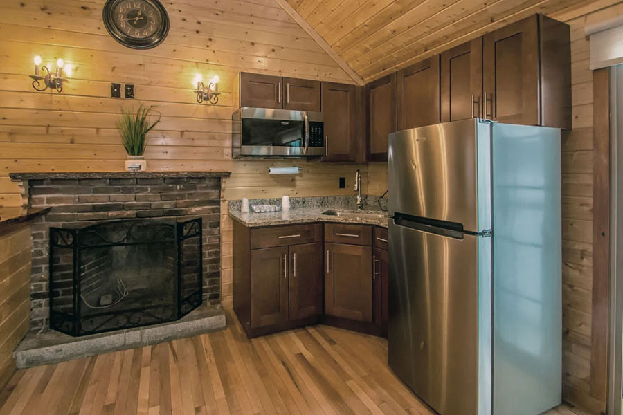 Refrigerator/freezer And Kitchenette In The Chestnut Premier Rental Cabin At The Pmr