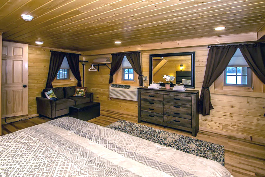 Bedroom Dresser And Chairs In The Chestnut Premier Rental Cabin At The Pmr